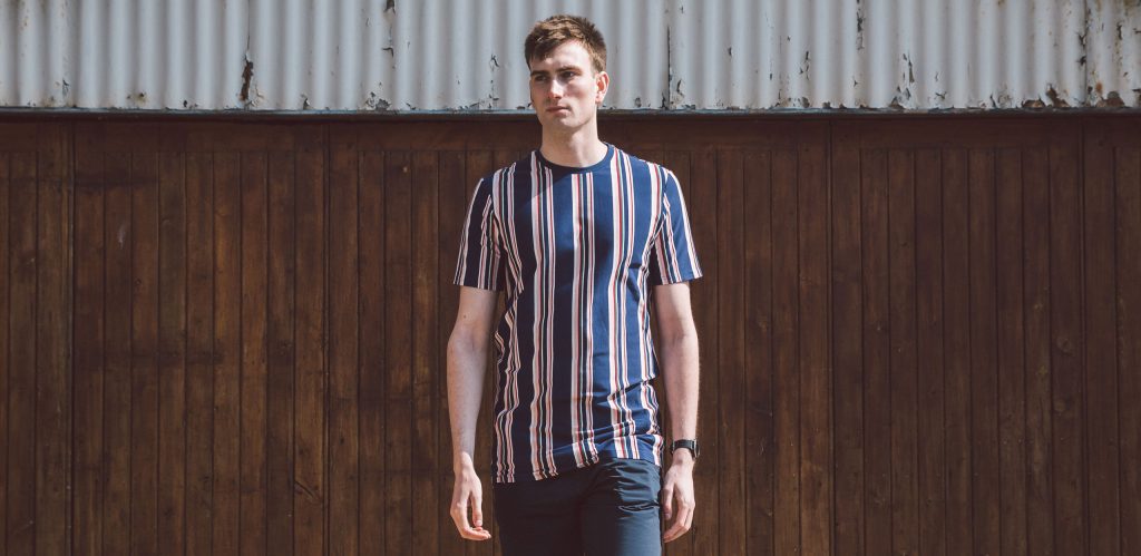 MODEL IS 6'9" / 206CM WEARING SIZE LT 2T STRIPED EXTRA LONG T-SHIRT (NAVY/RED)