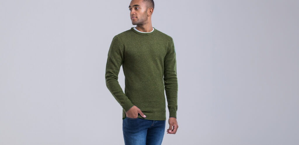Model is 6'7"/201CM wearing an Olive coloured size LT 2t Tall Lambswool Crew Neck Jumper.